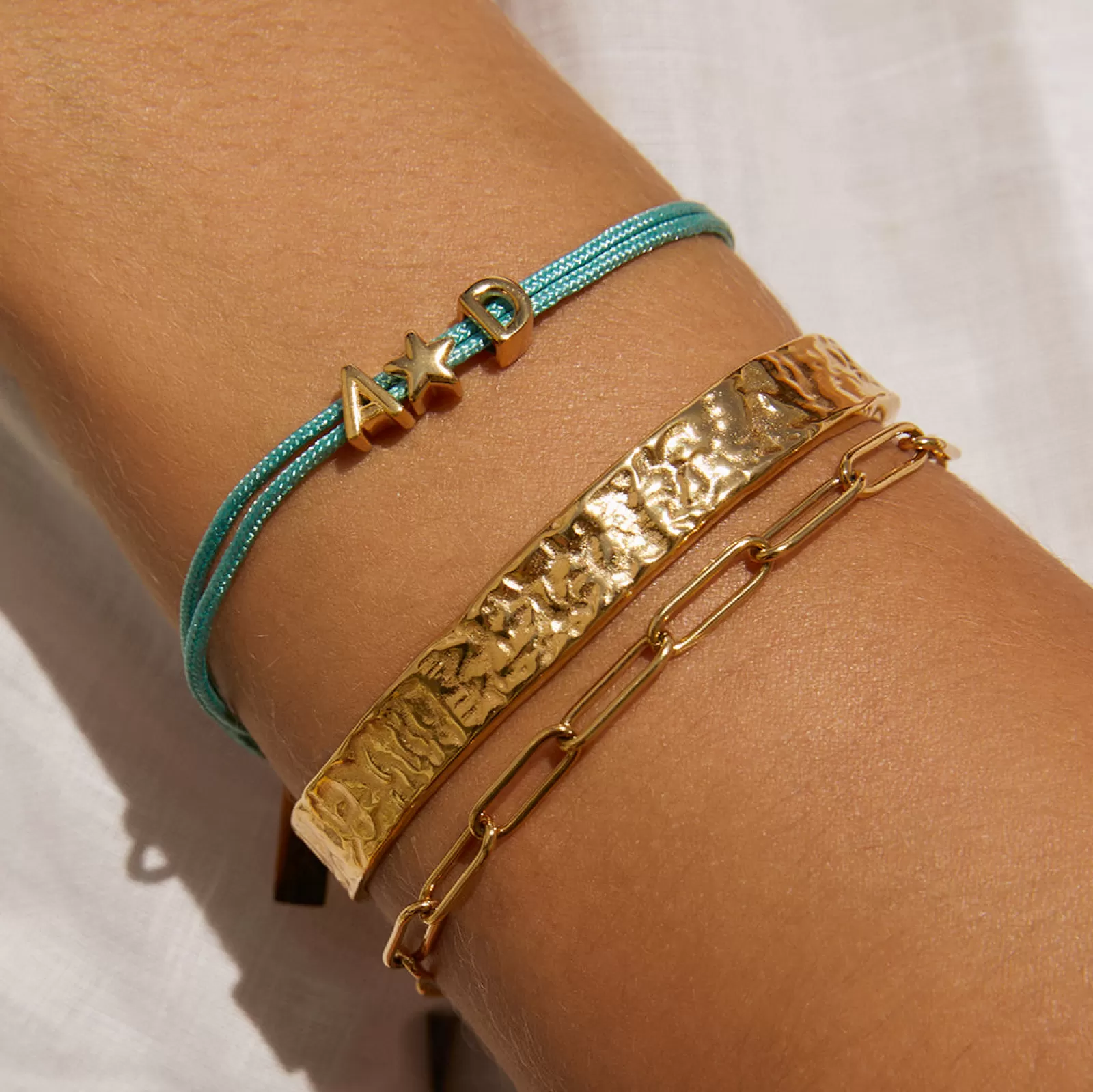 Arms Of Eve Friendship | Alphabet String Bracelet - Sky